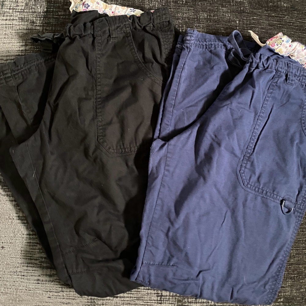 Two pair of Koi by Kathy Peterson scrub pants